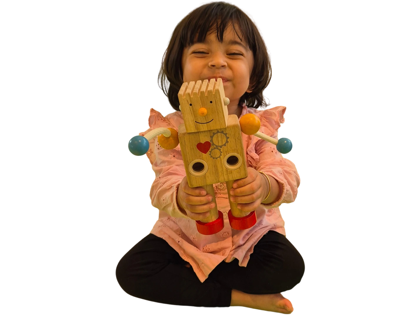 Smiling child with robot in Caterpillar Care preschool