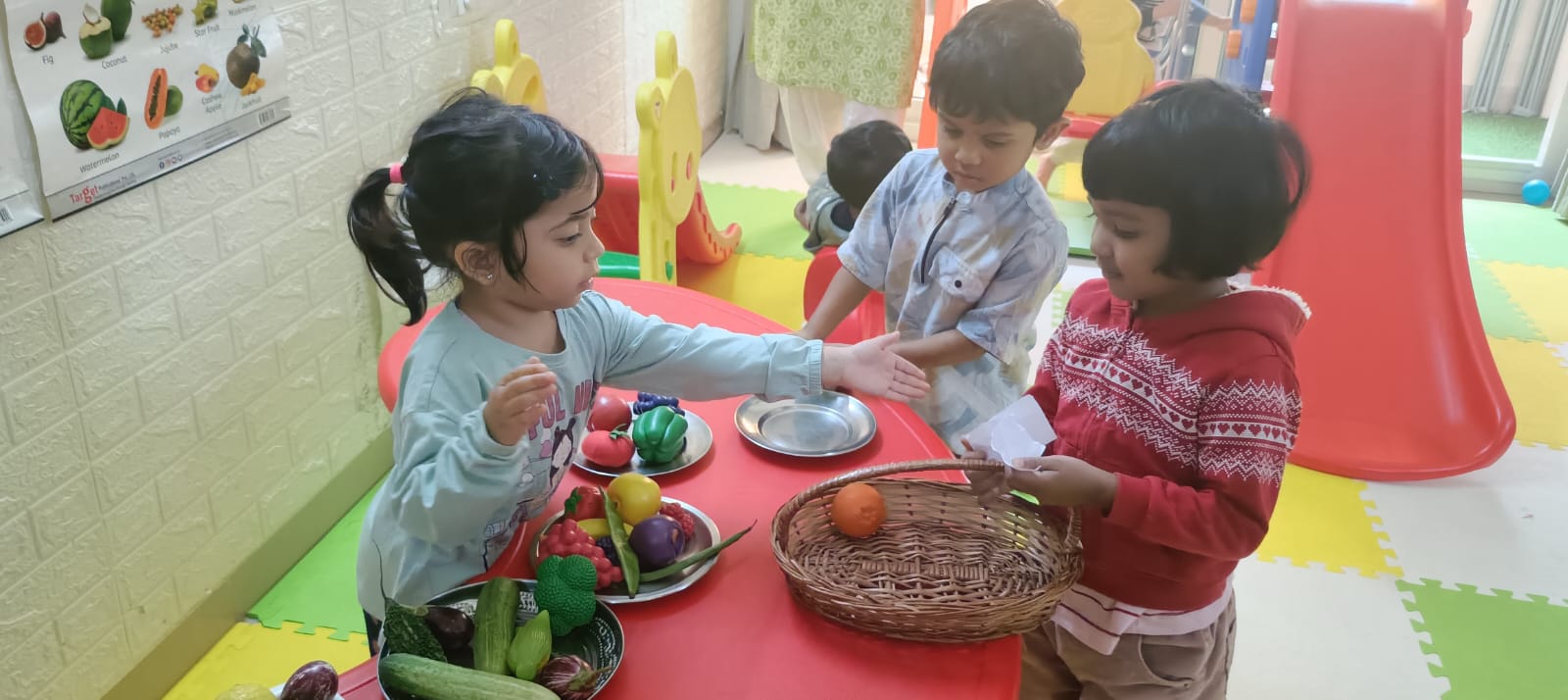 Children doing pretend play at Caterpillar Care Preschool @ Brigade Golden Triangle